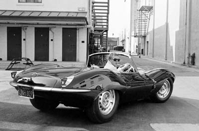 John Dominis, Steve McQueen driving his Jaguar XK-SS on Sunset Blvd, California 1963 - Galerie Stephen Hoffman, Munich (Germany)