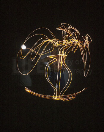 Pablo Picasso drawing light vase, by Gjon Mili//Time Life Pictures/ Galerie Stephen Hoffman