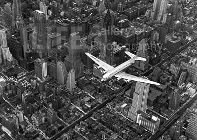 BOURKE-WHITE, MARGARET, DC-4: flying over buildings in midtown Manhattan - Aerial view of airline passenger plane, GSH
